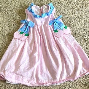 Adorable gingham dress with apple bows